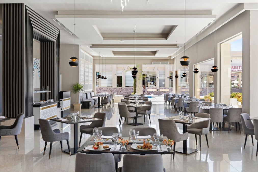 Elegant restaurant dining area with modern decor and neatly set tables