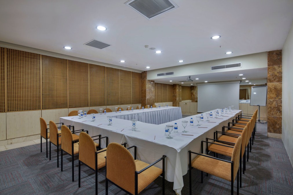 Conference room with U-shaped table setup