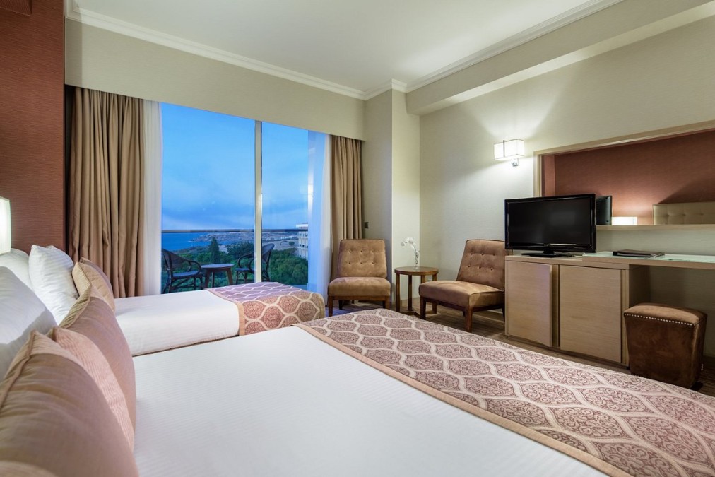 Twin room with coastal view