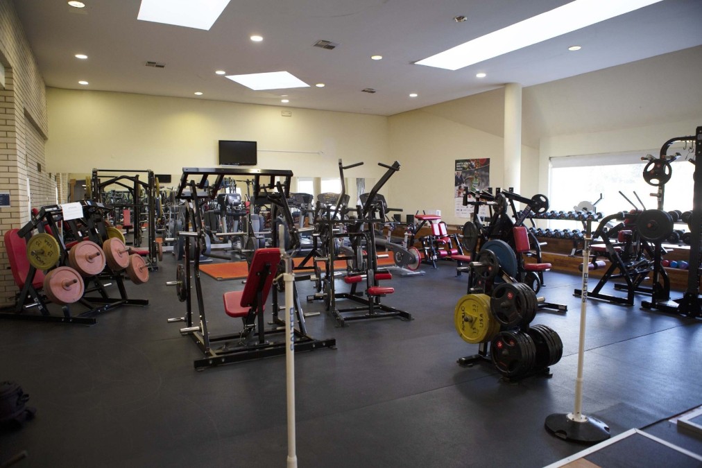 Gym hall with strength and cardio equipment