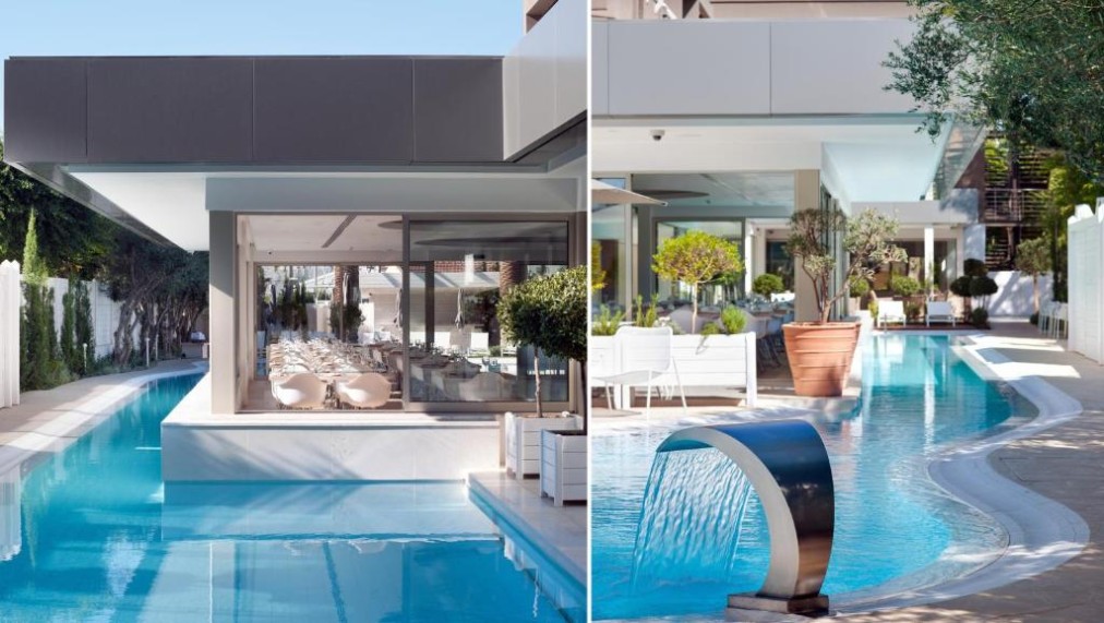 Split view of the outdoor pool area beside the hotel building and shaded seating.