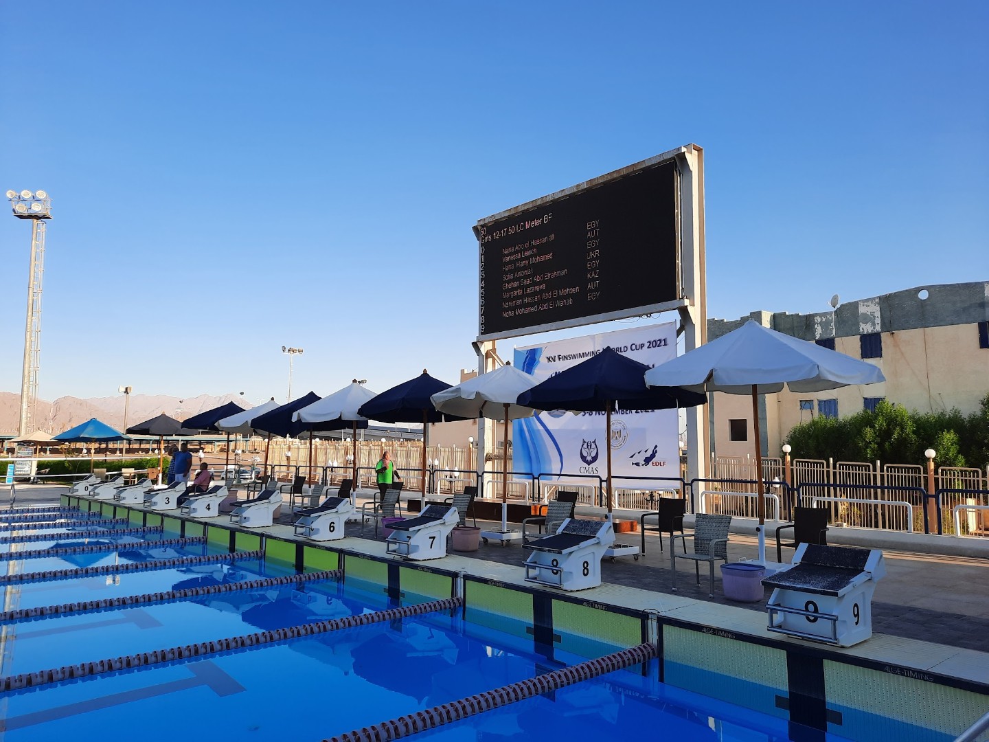 Numbered starting blocks along the 50m pool