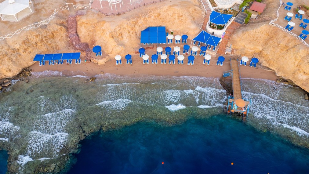 Plage privée avec jetée